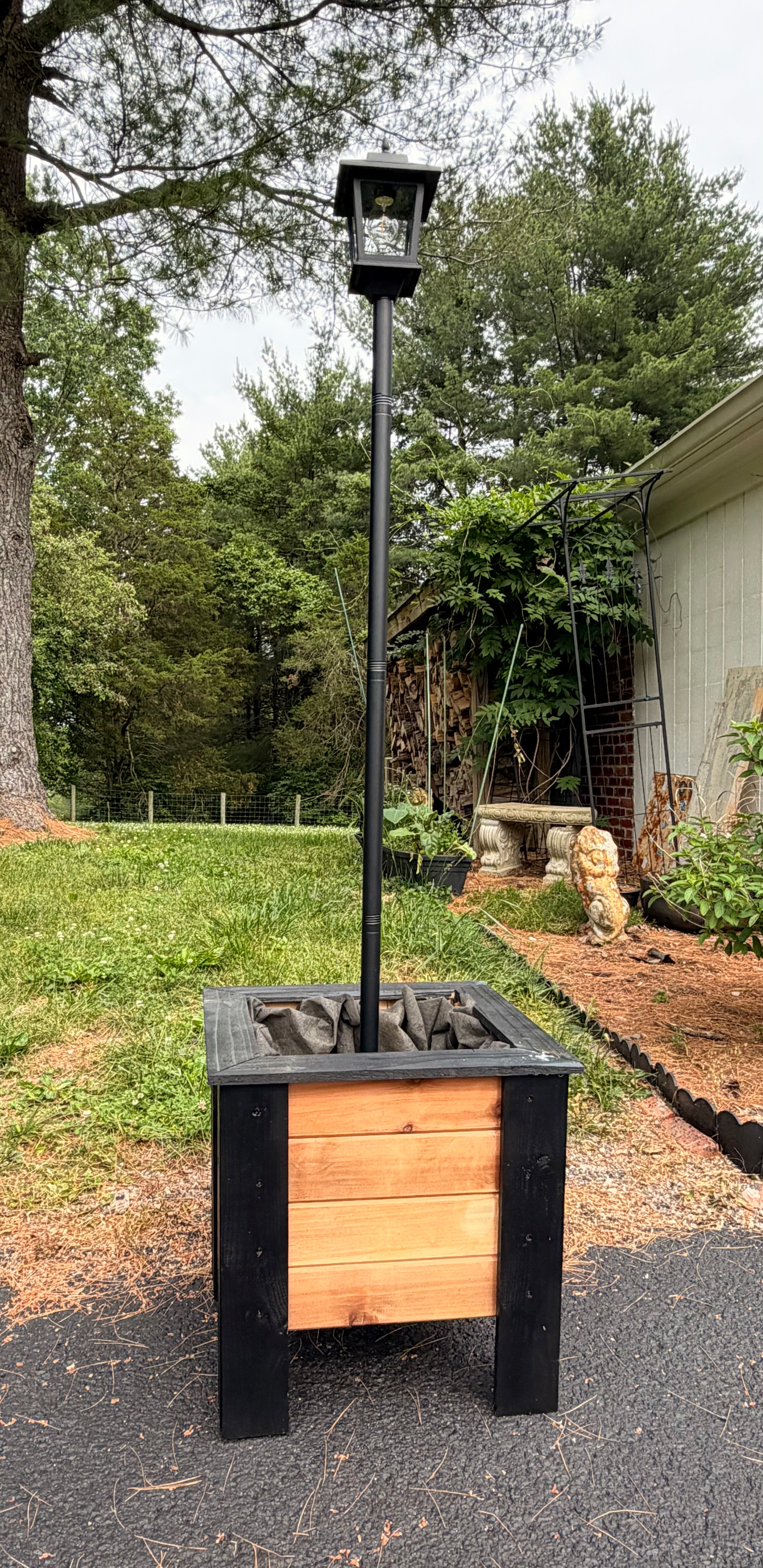 Handcrafted Raised Cedar Planter with solar lamp