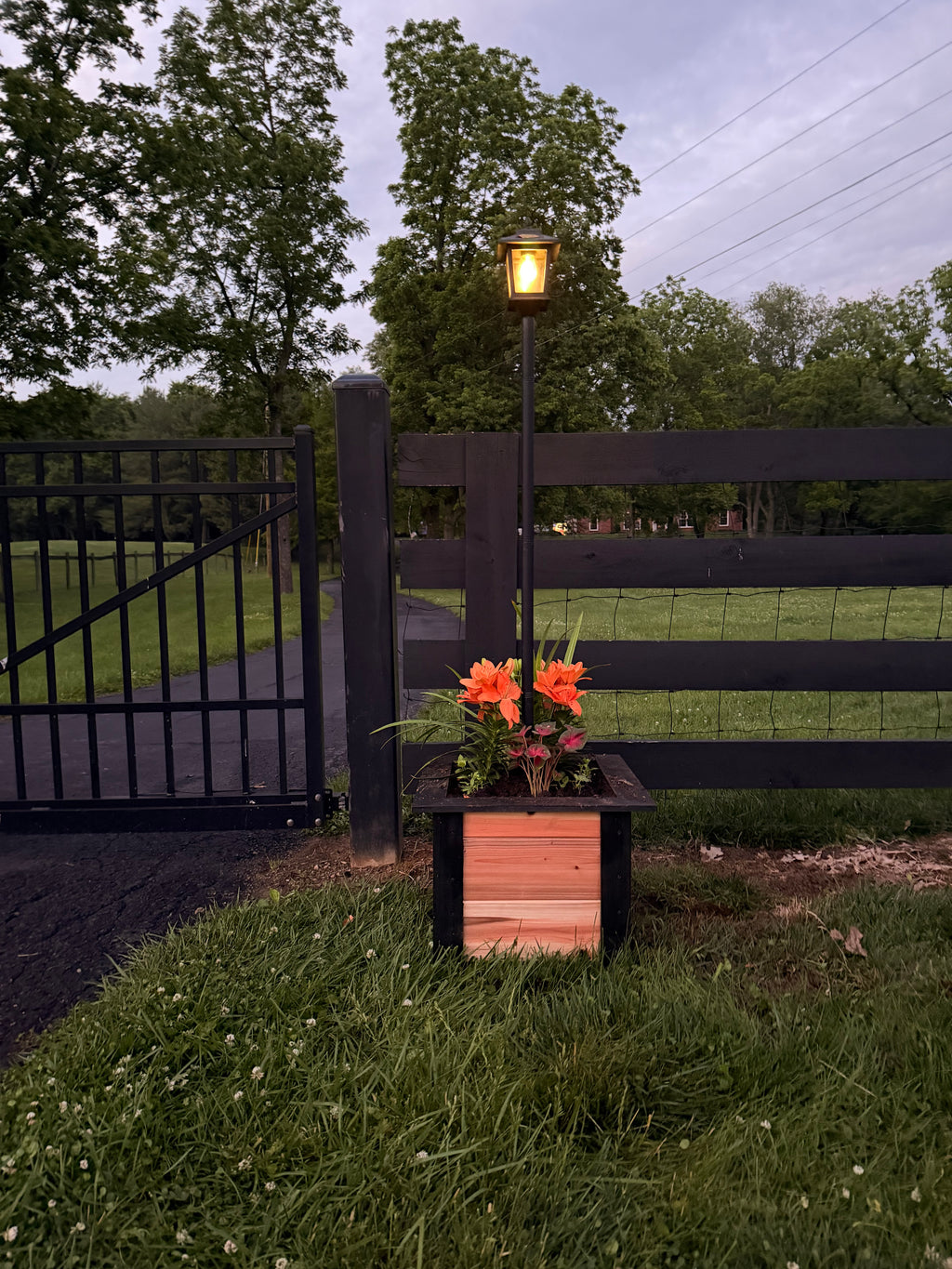 Handcrafted Raised Cedar Planter with solar lamp